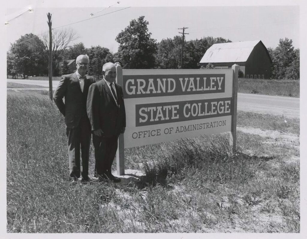 GV state college office with two employees historical image