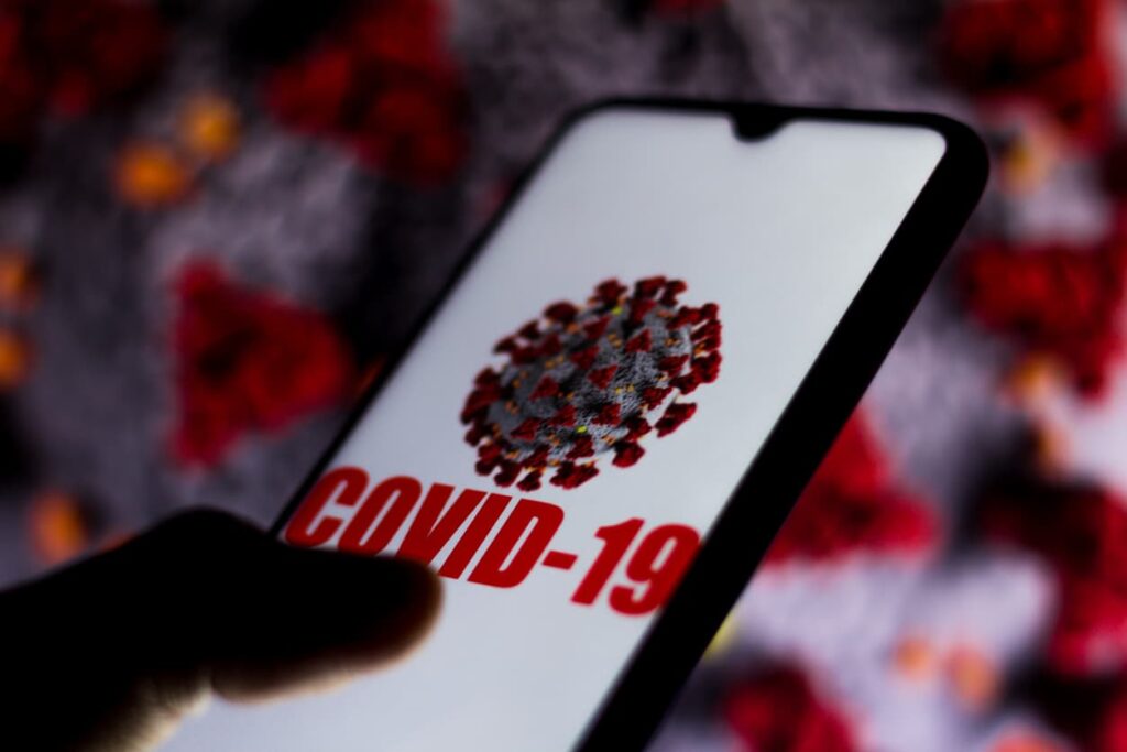 COVID-19 written on phone