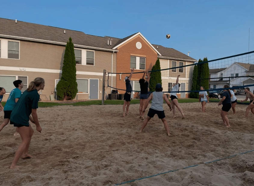 Students playing volleyball