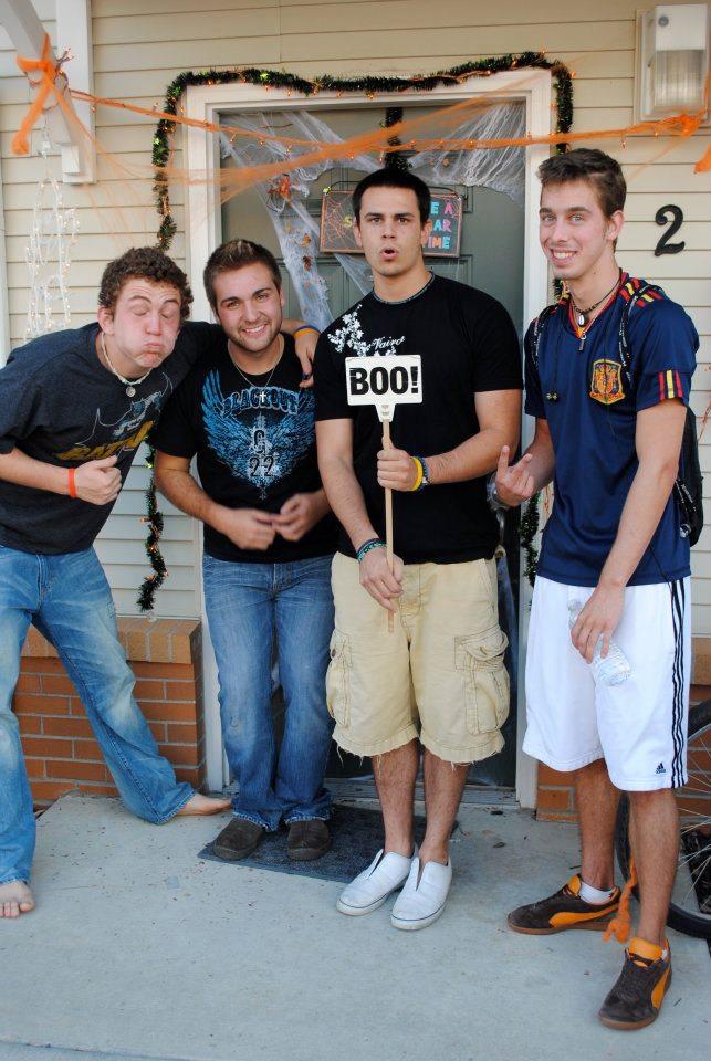 4 guys posing for Halloween photo