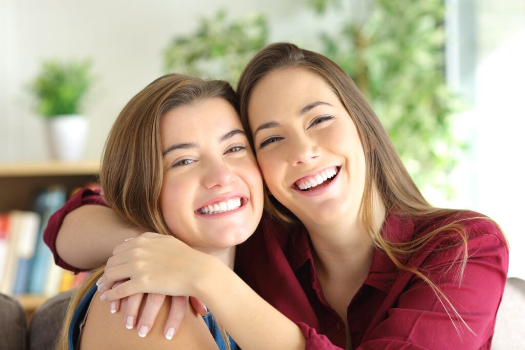 Happy women smiling