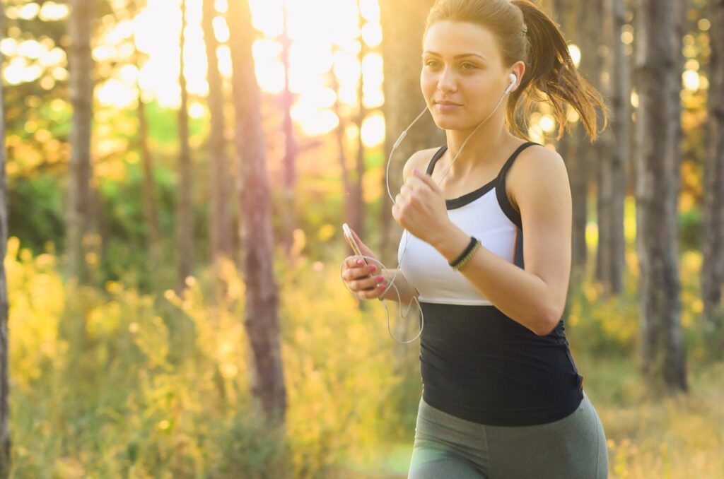 Woman running in woods