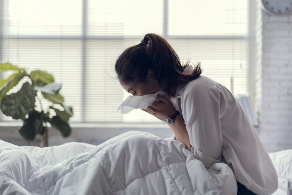 Woman in bed sick