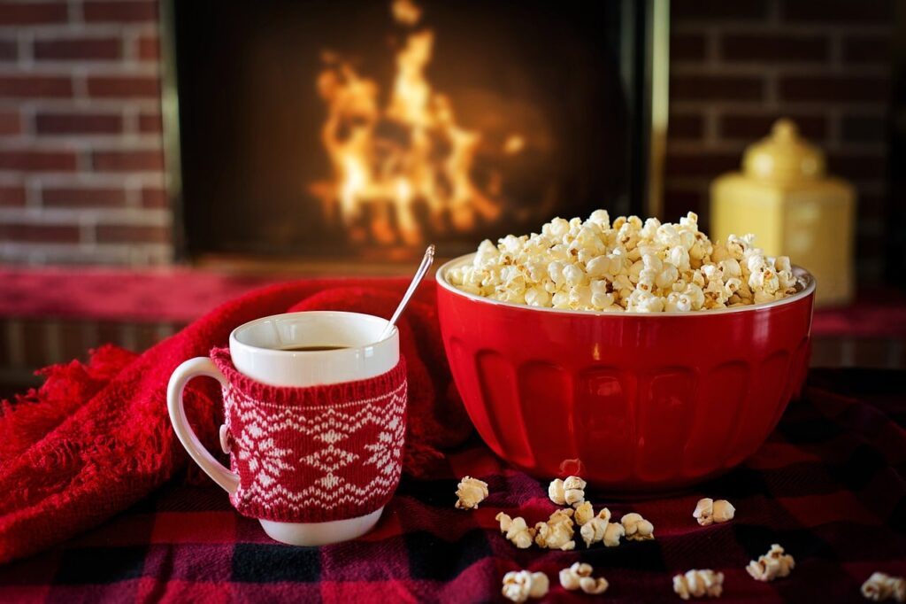 Popcorn and cocoa by fire
