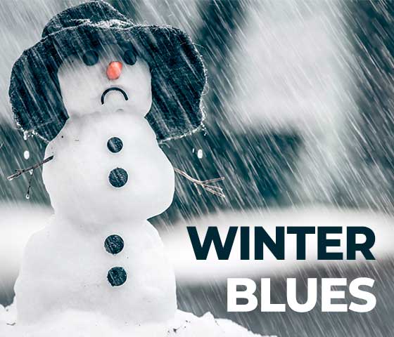 Sad snowman with 'winter blues' overlayed